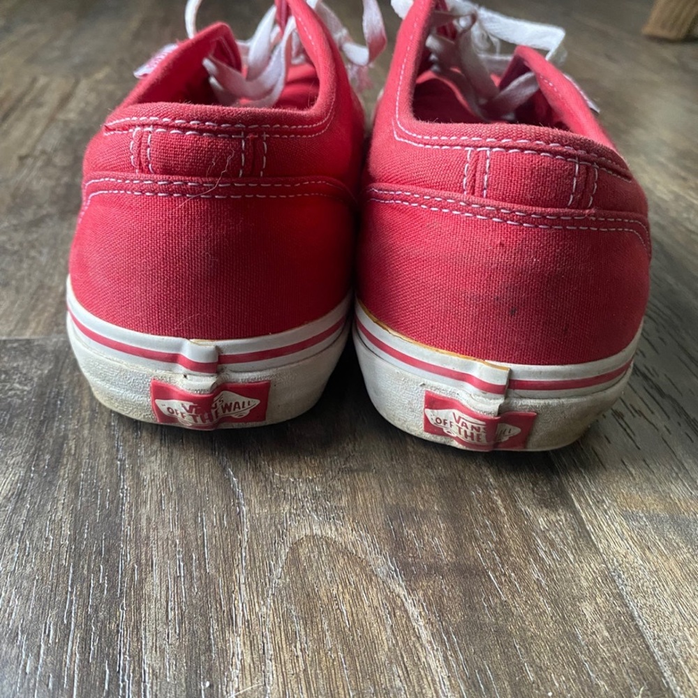 Red vans sneakers.